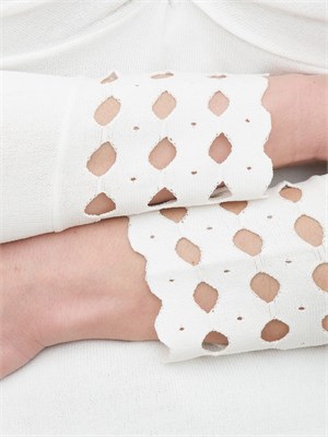 Maglia Nenette bianco panna polsi intagliati in DONNA