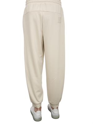 EA7 EMPORIO ARMANI Pantaloni jogger EA7Core Identity Unisex in misto viscosa stretch avorio in UOMO