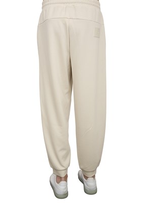 EA7 EMPORIO ARMANI Pantaloni jogger EA7Core Identity Unisex in misto viscosa stretch avorio in UOMO