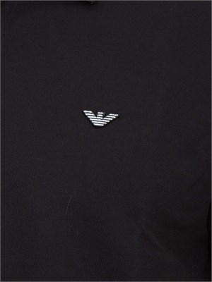 Polo nera Emporio Armani uomo con patch micro logo Aquila a contrasto in UOMO