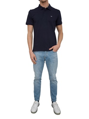 Polo blu Emporio Armani con patch logo in UOMO