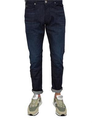 Jeans slim fit Emporio Armani uomo in denim scuro effetto washed in UOMO
