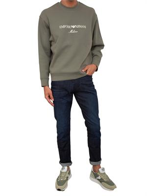 Jeans slim fit Emporio Armani uomo in denim scuro effetto washed in UOMO