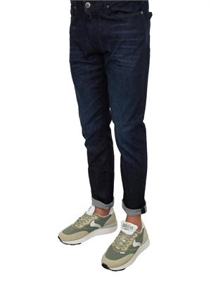 Jeans slim fit Emporio Armani uomo in denim scuro effetto washed in UOMO