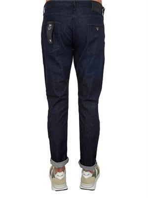 Jeans slim fit Emporio Armani uomo in denim scuro effetto washed in UOMO