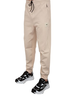 Pantaloni della tuta Boss beige con toppa con logo in UOMO