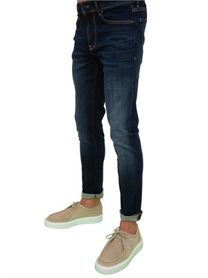 Jeans uomo slim Guess Jeans con lavaggio scuro effetto used in UOMO