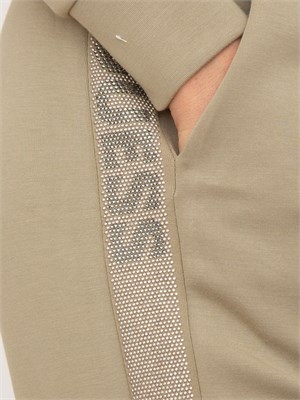 Pantaloni jogger verdi Guess Jeans donna con banda logo laterale in DONNA