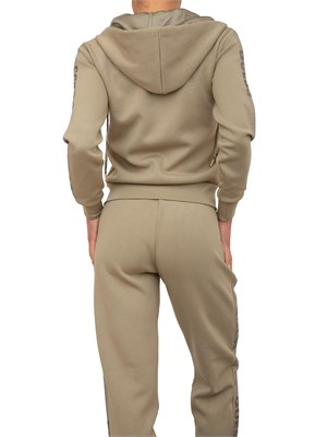 Felpa verde Guess Jeans donna con cappuccio, zip e manica lunga con logo strass. in DONNA