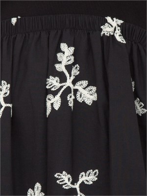 Abito lungo Kocca in cotone nero con gonna ricamo floreale a contrasto in DONNA