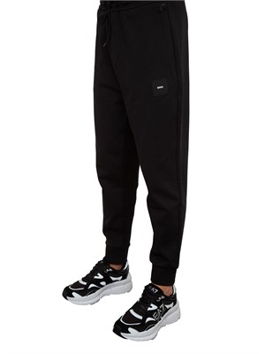 Pantaloni della tuta Boss nero con toppa con logo in UOMO