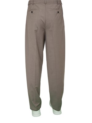 Pantalone uomo grigio tortora Emporio Armani dal taglio classico e dritto con pinces in UOMO