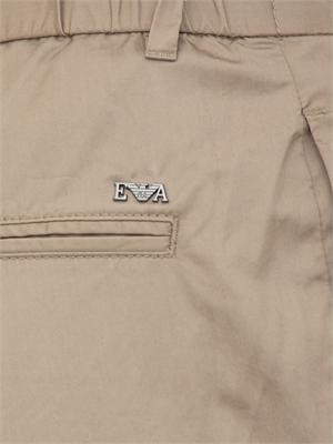 Pantaloni uomo Emporio Armani modello chino in cotone stretch tortora in UOMO