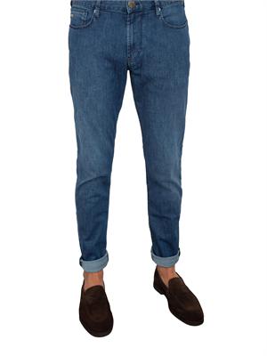 Jeans uomo slim fit Emporio Armani con vita bassa e lavaggio blu medio in UOMO