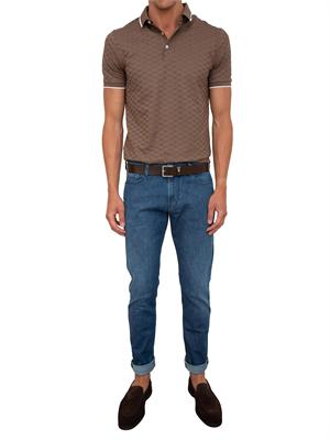 Jeans uomo slim fit Emporio Armani con vita bassa e lavaggio blu medio in UOMO