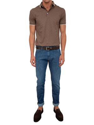 Jeans uomo slim fit Emporio Armani con vita bassa e lavaggio blu medio in UOMO