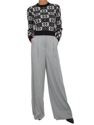 Maglia cropped Pinko in lana con fantasia logo all over nera e bianca in DONNA