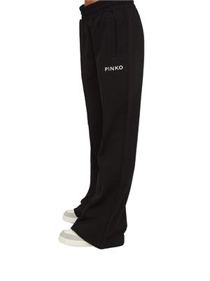 Pantaloni jogger Pinko modello flare in morbido cotone nero e logo a contrasto in DONNA