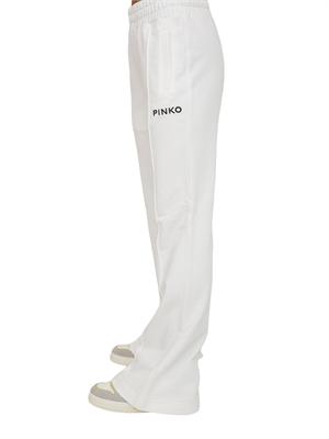Pantaloni jogger Pinko modello flare in morbido cotone bianco e logo a contrasto in DONNA