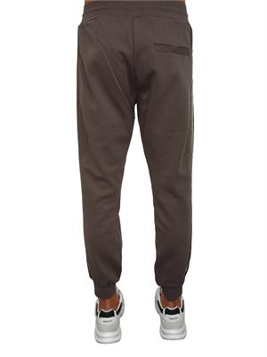 Pantaloni tuta Antony Morato in misto cotone interlock verde militare con bande laterali in UOMO