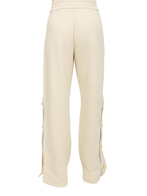 Pantaloni tuta Pinko in cotone avorio con bottoni dorati in DONNA