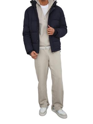 Pantalone tuta Guess Jeans uomo in cotone tortora con bande logo in UOMO