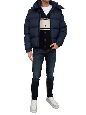 Jeans uomo Emporio Armani in cotone blu scuro e sabbiature in UOMO