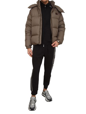 Pantaloni tuta uomo Emporio Armani in double jersey nero con logo jacquard in UOMO