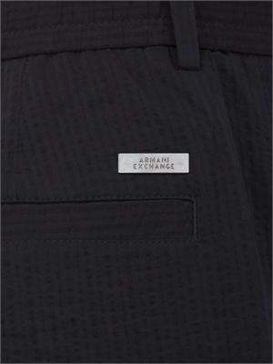 Pantaloni Armani Exchange uomo in tessuto blu in UOMO
