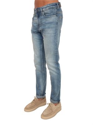 Jeans BOSS Uomo in denim effetto used in UOMO
